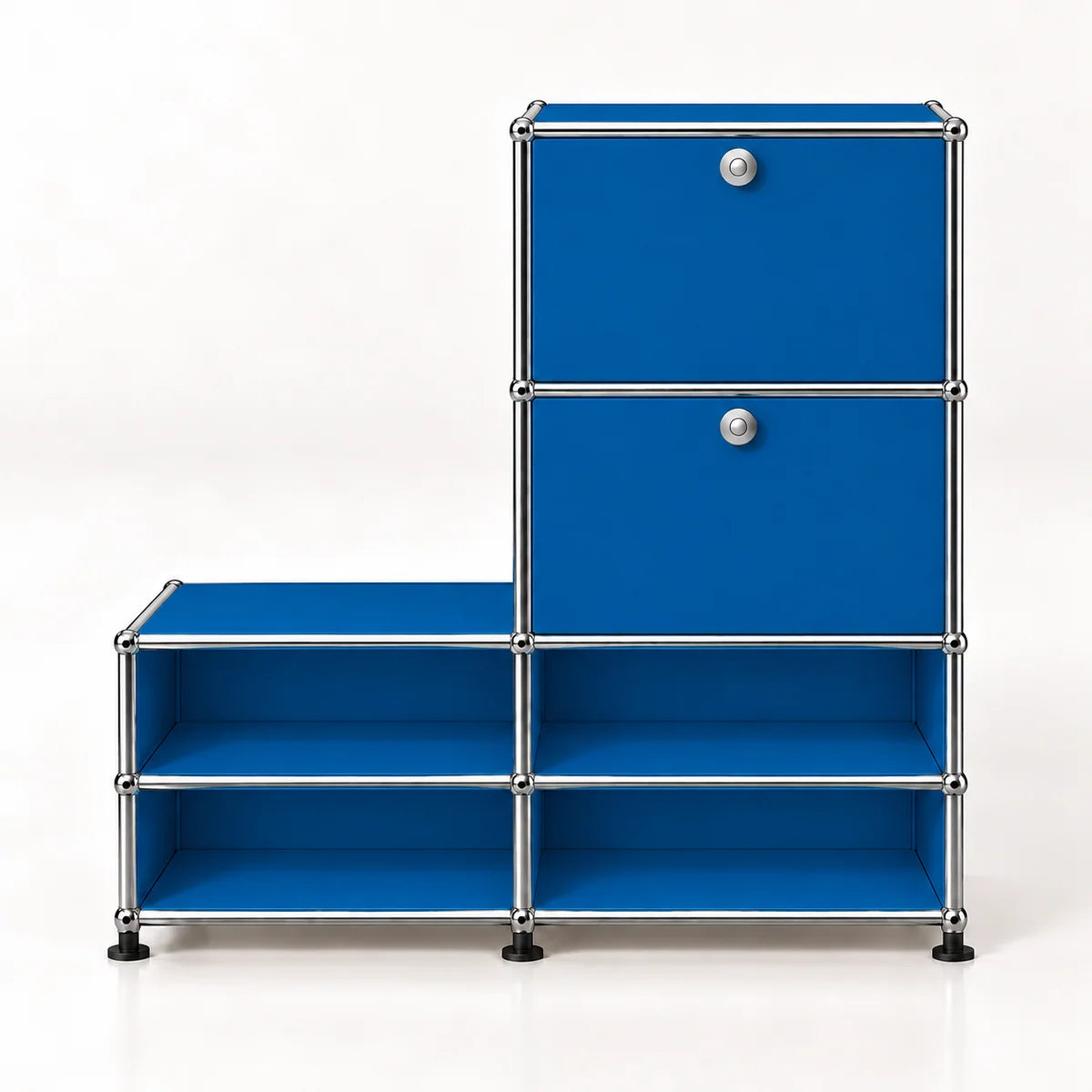 A modular storage cabinet with bright blue metal panels and a chrome metal frame, featuring two upper doors with round silver knobs and four lower open shelves, set against a plain white background.