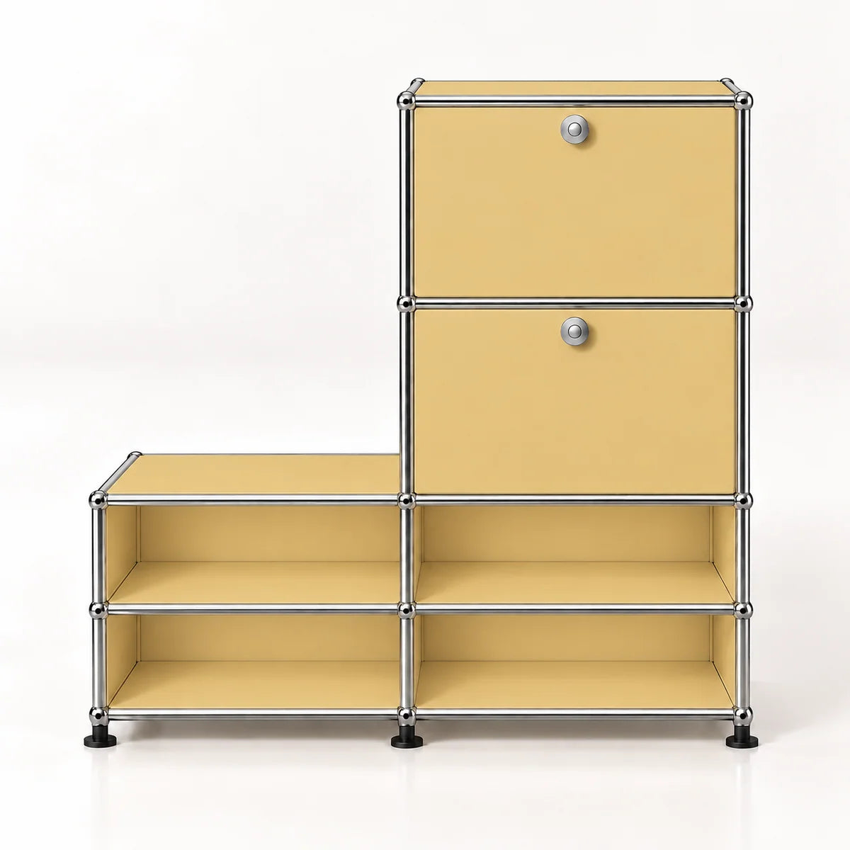 A modular storage organizer with a warm yellow metal panel design and a chrome metal frame, featuring two upper drawers with round silver knobs and four lower open shelves, set against a plain white background.