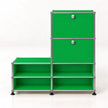 A green modular storage cabinet with two upper doors and four lower open shelves, constructed from bright green panels and silver metal tubing with black feet, shown on a white background.