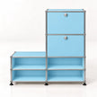 A modular storage cabinet made of light blue panels and silver metal tubing with black feet, shown on a clean white background.