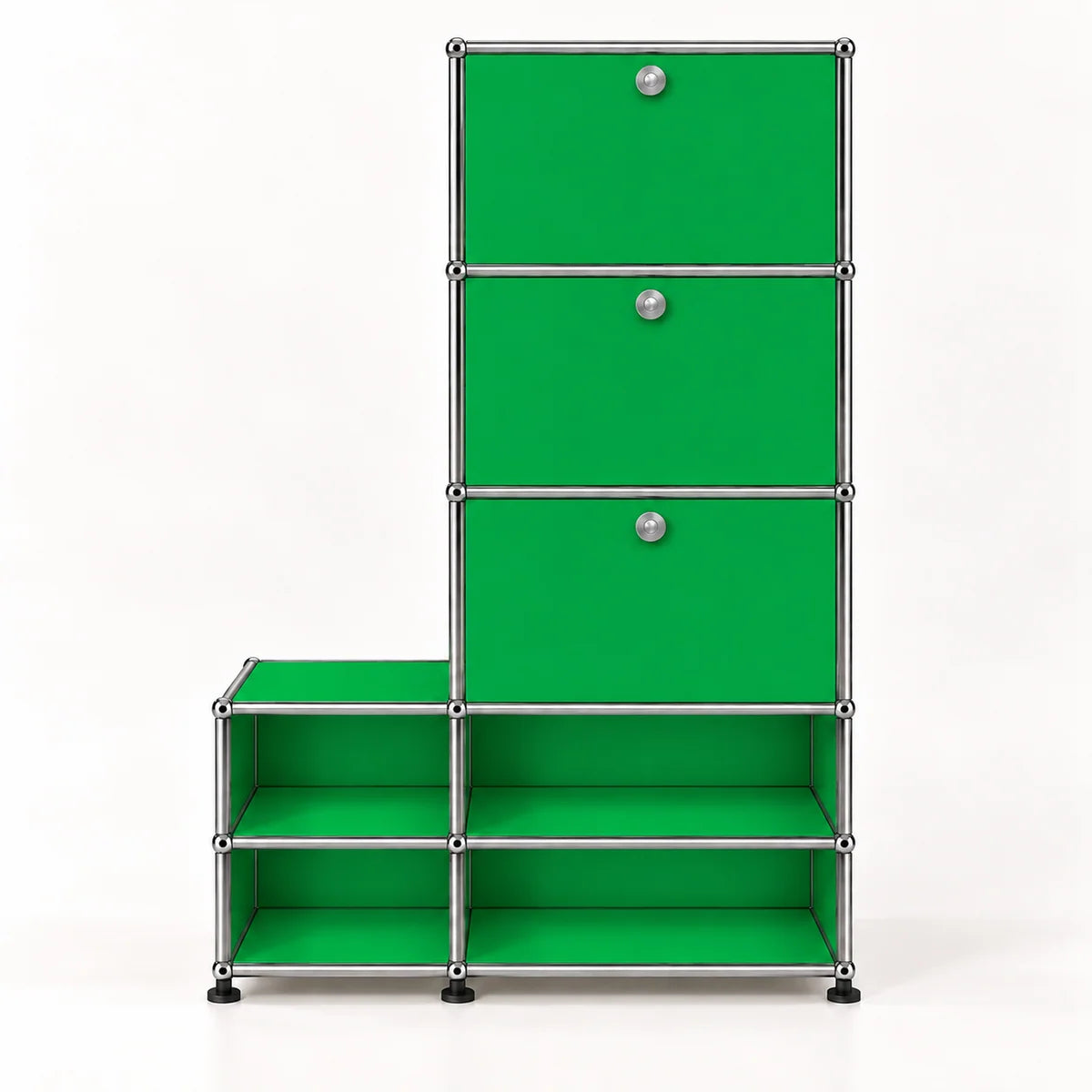 A green modular storage organizer with a chrome metal frame, featuring three drawers on the upper right with round silver knobs and four open shelves on the bottom, set against a plain white background.