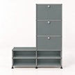 A modular storage cabinet and shelf unit made of gray panels connected by silver metal rods, with three drawers on the right and four open shelves, shown on a white background.