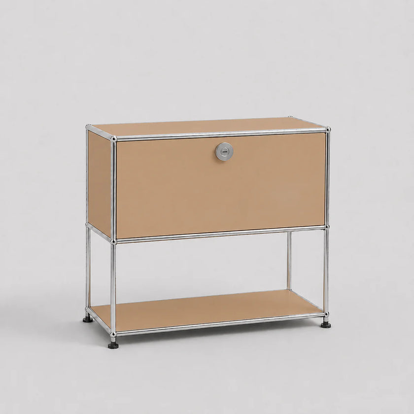A modern modular two-tier storage cabinet with a silver chrome wire frame, tan canvas panels, and a silver round lock on the upper drawer front, set against a neutral light gray background.