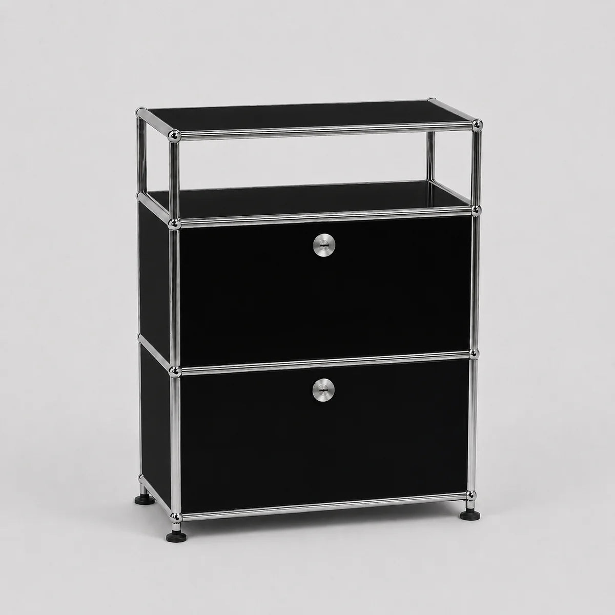 A modern black and chrome modular two-drawer storage cabinet with an open top shelf, shown on a light gray background.