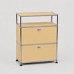 A modern two-drawer modular storage cabinet with a chrome tubular metal frame and light beige panels, set against a plain light gray background.