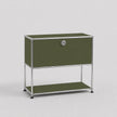 A modern modular two-tier storage cabinet with olive green fabric panels and a chrome metal frame, featuring a lock on the upper door and small black feet on the legs, set against a light gray background.