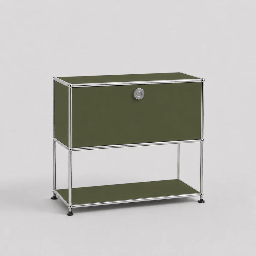 A modern modular two-tier storage cabinet with olive green fabric panels and a chrome metal frame, featuring a lock on the upper door and small black feet on the legs, set against a light gray background.