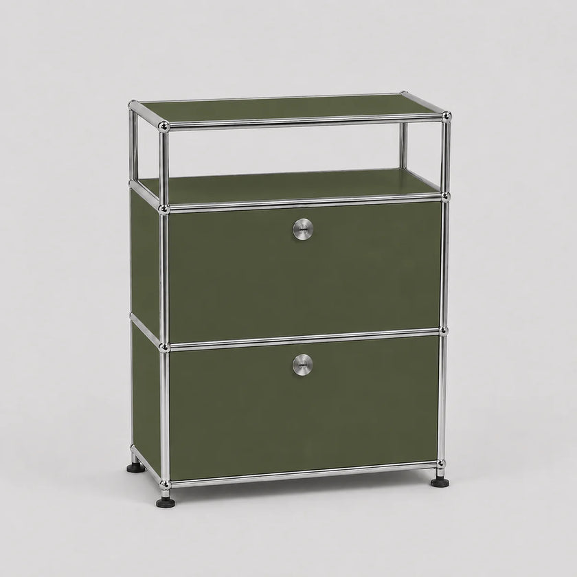 An olive green modular storage cabinet with two drawers and an open top shelf, framed in polished chrome metal with round silver knobs, on a light gray background.