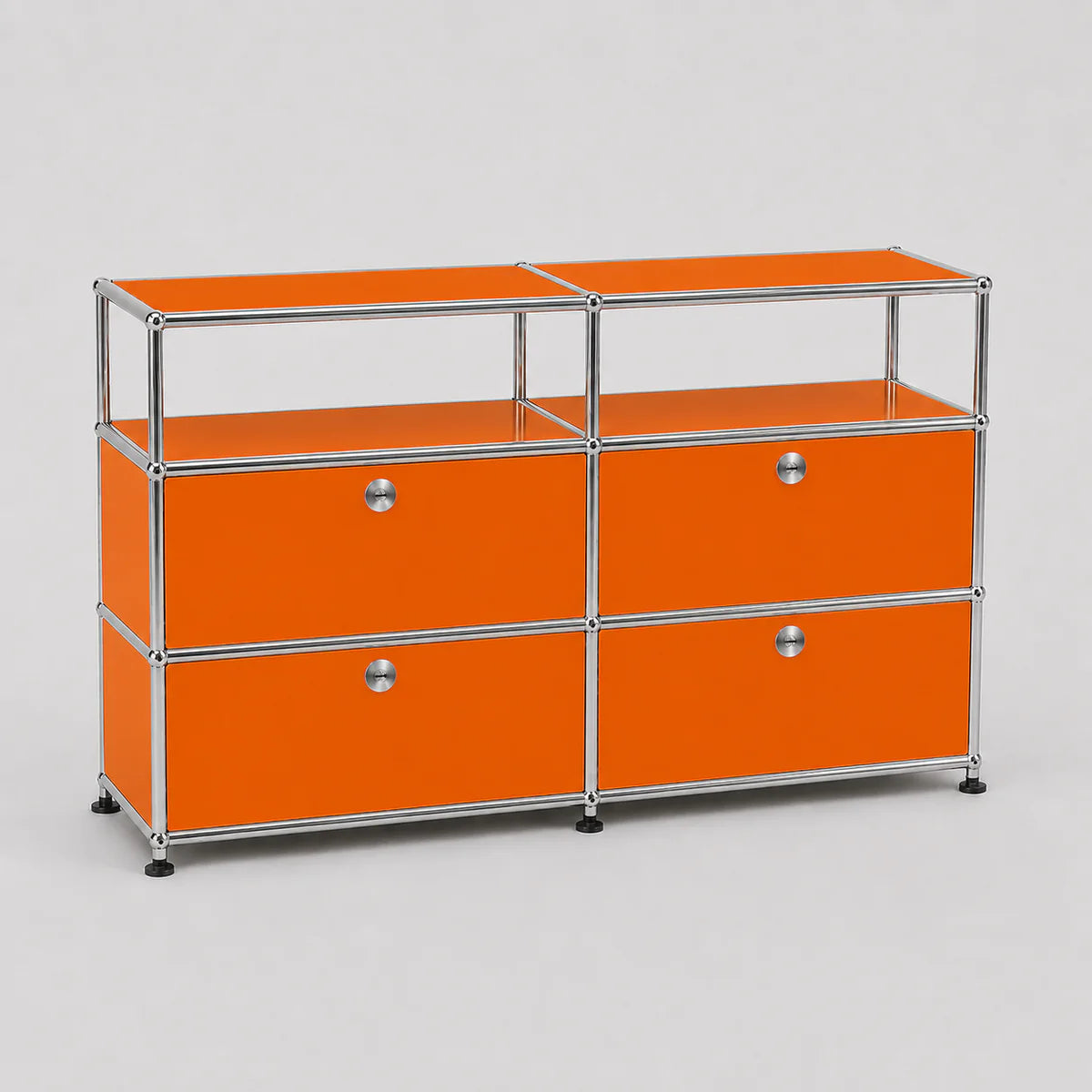 An orange modular storage cabinet with a chrome metal frame and four drawers, set against a neutral gray background.
