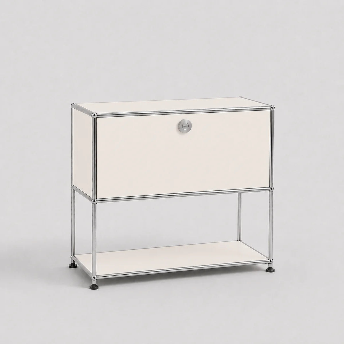 A modern modular two-tier nightstand with a chrome wire frame and cream-colored panels, featuring a single drawer on the top tier and an open shelf on the bottom, set against a plain light gray background.