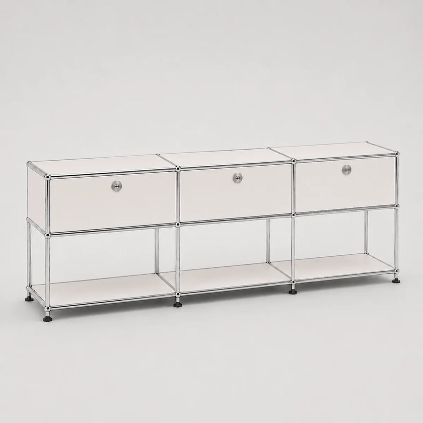 A modern modular storage cabinet with three drawers and two open shelves, featuring a chrome wire frame and frosted off-white panels, set against a plain light gray background.