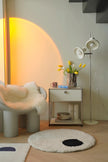 Modern interior with a chair, replica USM modular side table, and floor lamp.