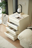 Beige storage containers with multiple drawers in a room setting.