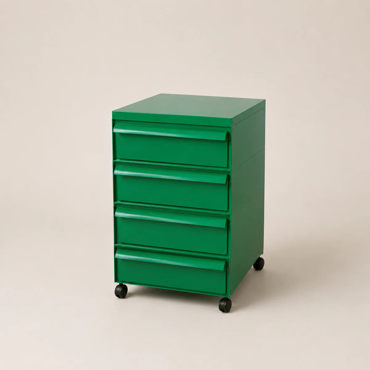 Green abs plastic file cabinet with multiple drawers on a beige background
