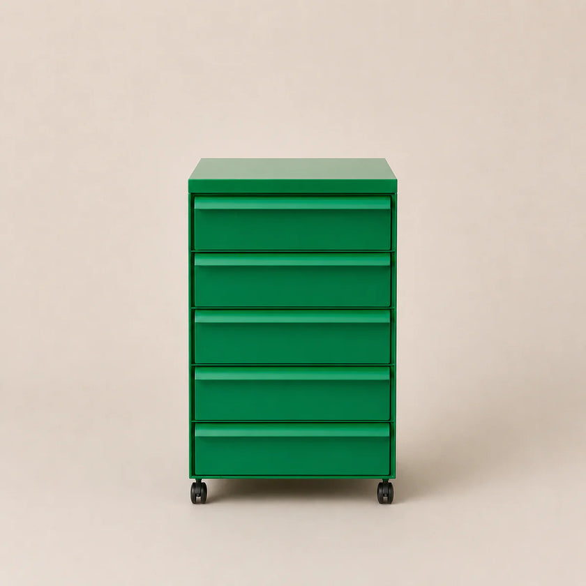 Green abs plastic drawer unit on wheels against a beige background