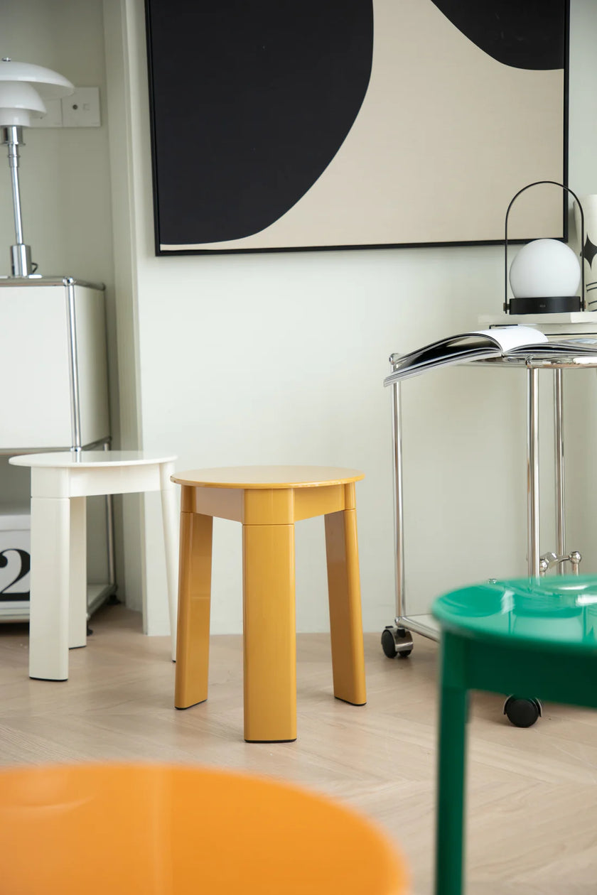 Colorful shower stools in a room with a modern decor.