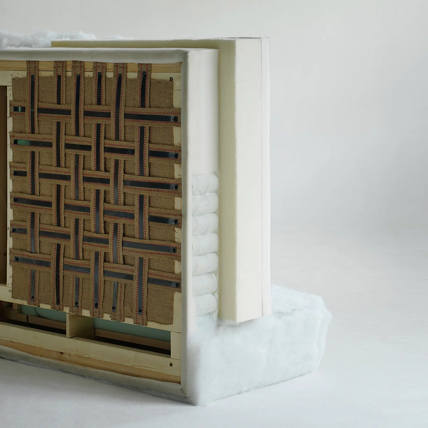 Wooden headboard with woven design on a white background