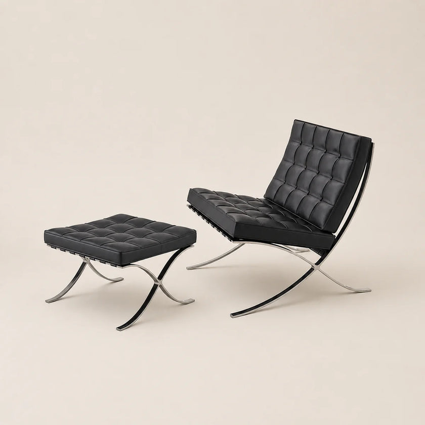 Black leather chair and ottoman on a beige background
