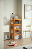 Orange modular coffee table diy corner shelf with decorative items in a room setting