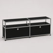 A modern modular two-compartment media console or storage cabinet with black panels and a chrome metal frame, shown on a light gray background.