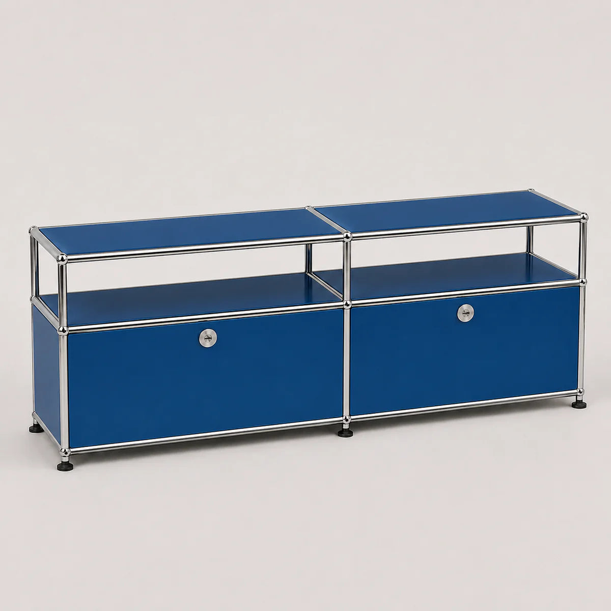 A modern modular two-compartment media console or storage cabinet with a blue laminate finish and a chrome tubular metal frame, shown on a light gray studio background.
