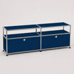 A modern modular storage cabinet with a chrome metal frame, dark blue fabric panels, and two small feet on the bottom, shown on a light gray background.