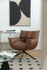 Brown leather swivel chair in a modern room with abstract art on the wall.