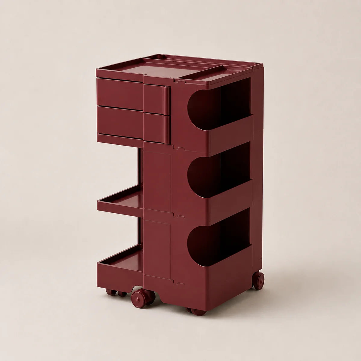 A dark red plastic rolling organizer cart with multiple drawers, shelves, and open compartments, shown on a plain beige background.