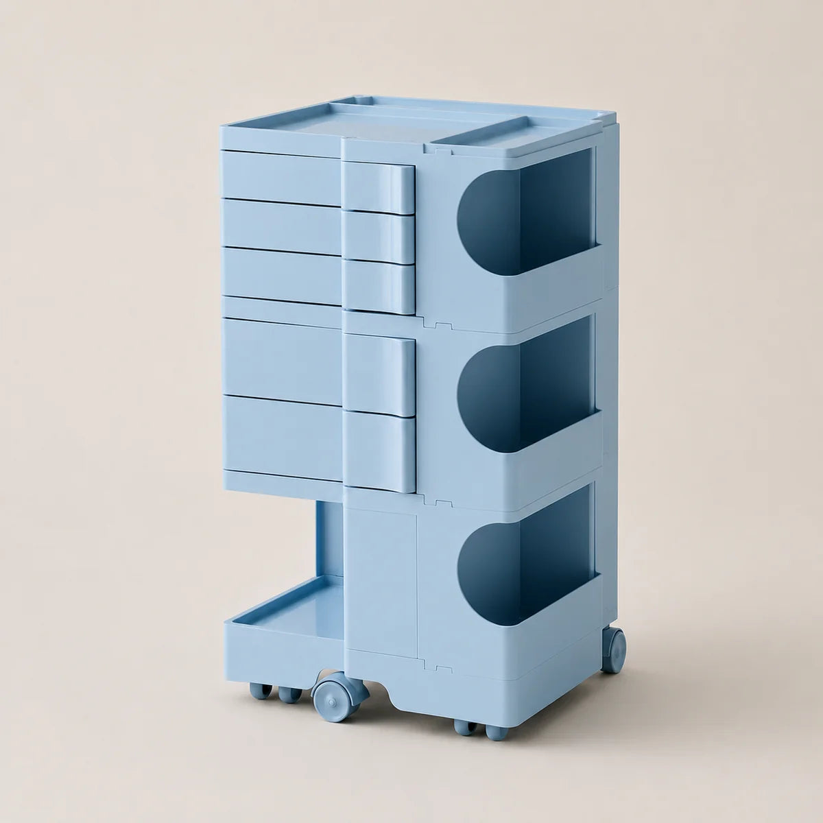 A light blue storage cart with multiple drawers, open shelves, and caster wheels, shown on a plain beige studio background.
