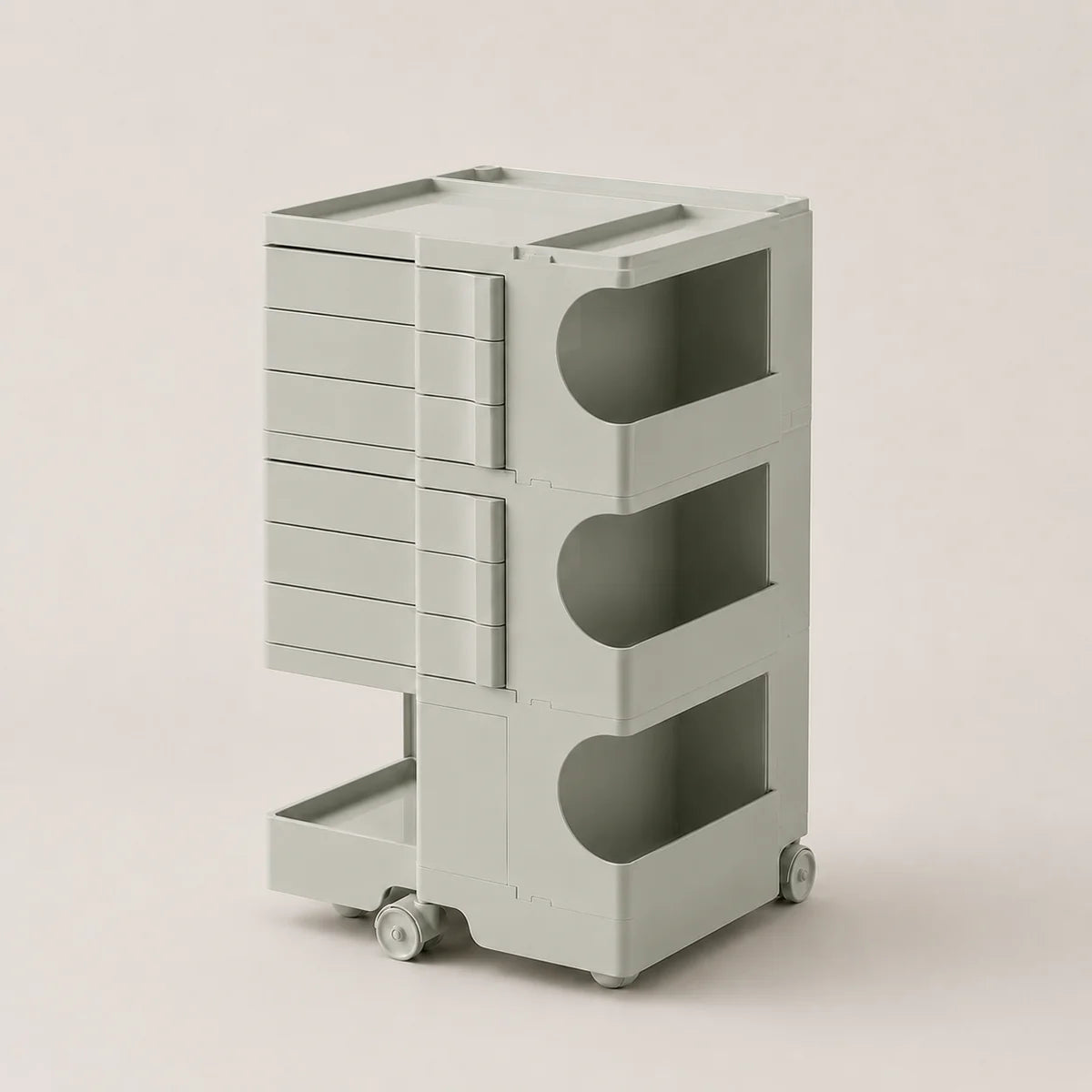 A light sage green ABS rolling storage cart with multiple drawers and open shelves, shown on a plain light beige background.