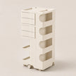 An off-white plastic rolling storage organizer with four drawers on the left, four open shelves on the right, and small caster wheels at the base, shown against a solid light beige background.