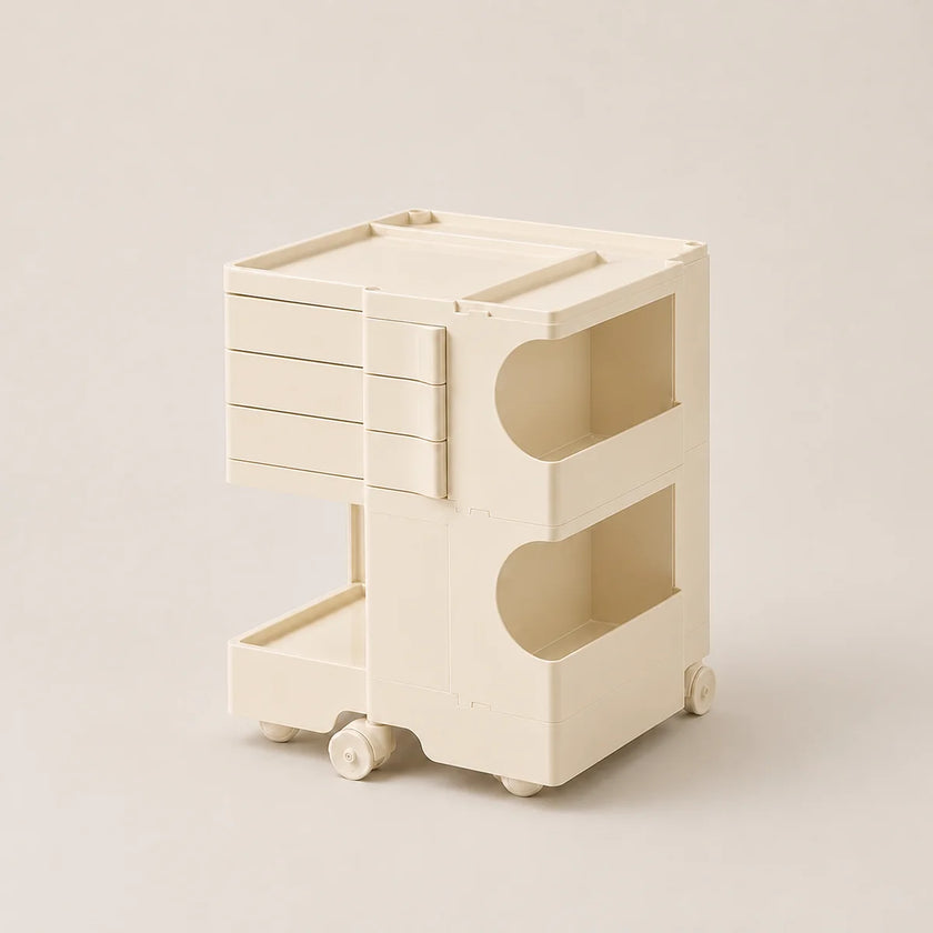 A minimalist, off white ABS plastic rolling storage organizer with three tiers, shown on a solid light beige background.
