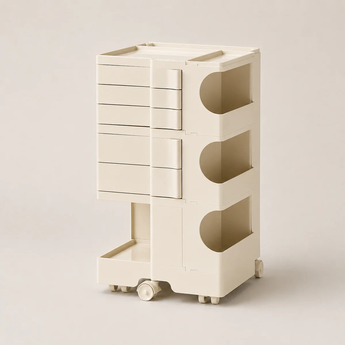 An off-white ABS rolling organizer with multiple drawers, open shelves, and a lower pull-out tray, shown on a neutral beige background.