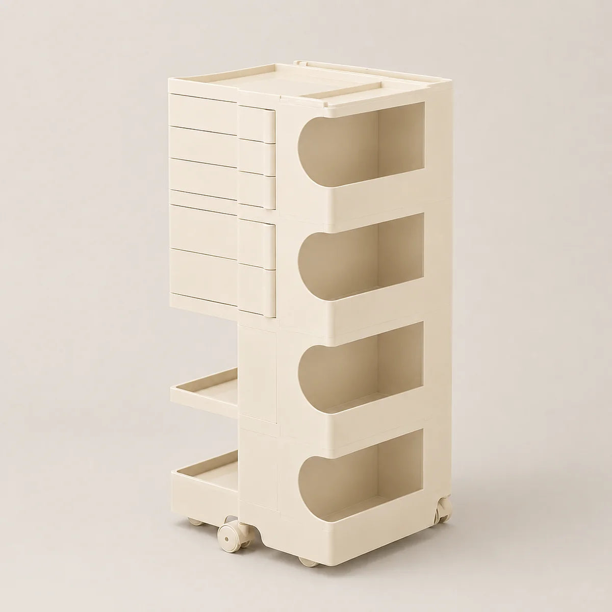 An off-white plastic rolling organizer cart with five drawers on the left, four open shelves with curved cutouts on the right, and small caster wheels at the base, shown on a neutral light beige background.