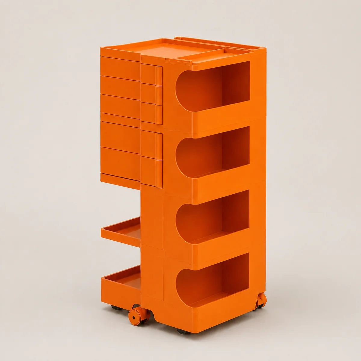 Bright orange plastic storage organizer with drawers, open shelves, and caster wheels, photographed on a clean light gray studio background.