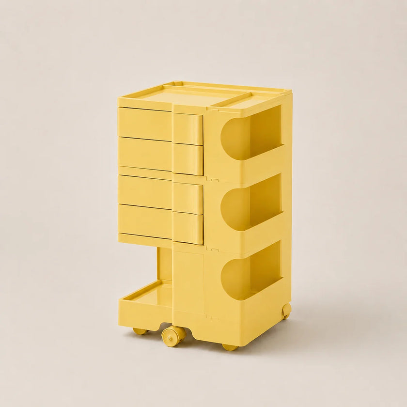 A tulip yellow ABS plastic rolling storage cart with five drawers on the left and three open shelves on the right, set against a solid light beige background.