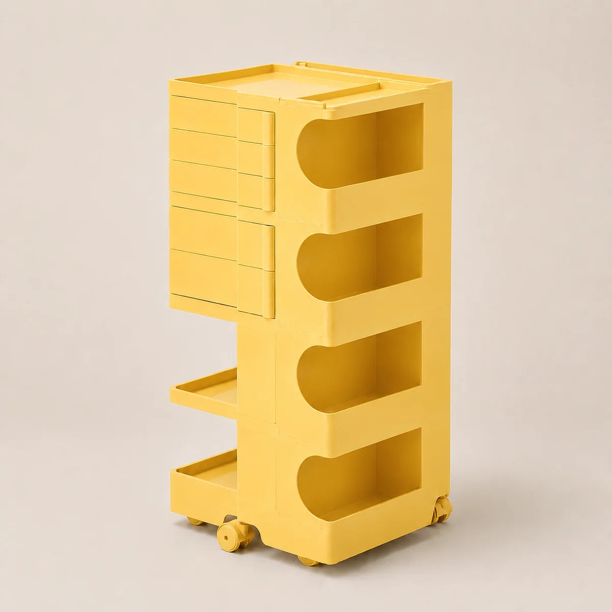 A bright yellow storage cart with four drawers, four open shelves, and caster wheels, shown on a neutral light beige background.