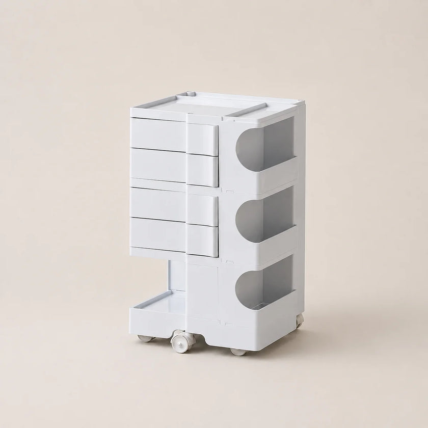 A white three-tier rolling storage organizer with drawers on the left and open shelves on the right, shown on a plain beige background.