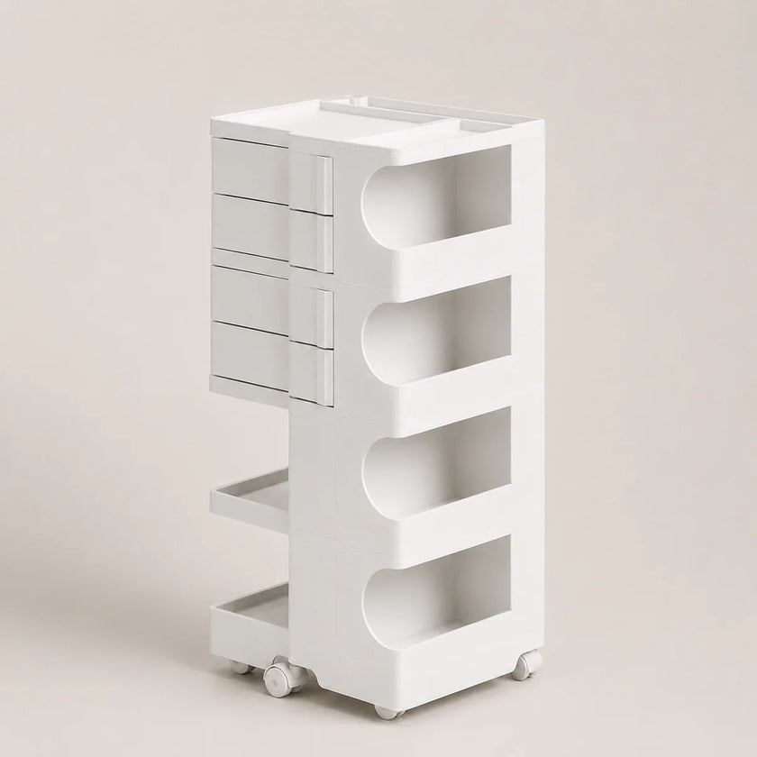 A white rolling storage organizer with four drawers on the left and four open shelves with curved cutouts on the right, shown on a plain beige studio background.