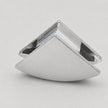 A modern geometric triangular wall hook or cabinet pull in a brushed silver metal finish, shown on a neutral light gray background.