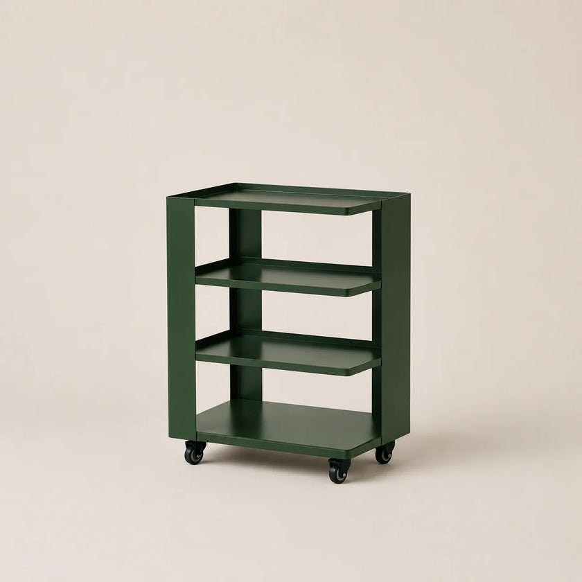 Green metal shelf with four shelves on wheels against a beige background