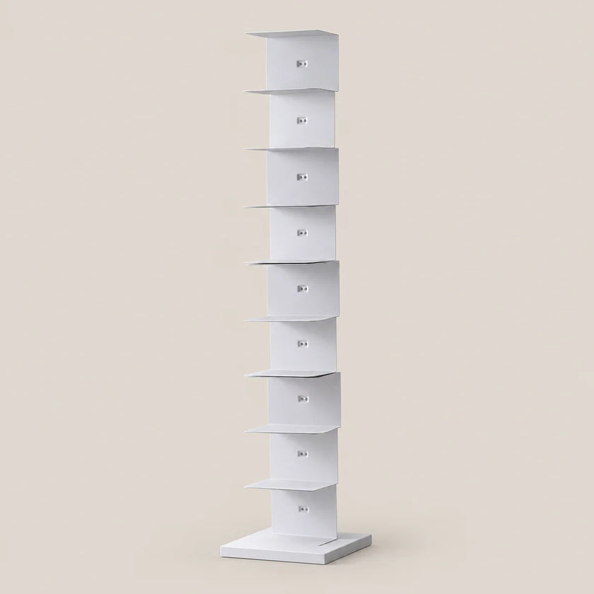 A tall, narrow white display stand with multiple tiered shelves, shown on a plain warm beige background.