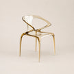 Gold chair on a beige background