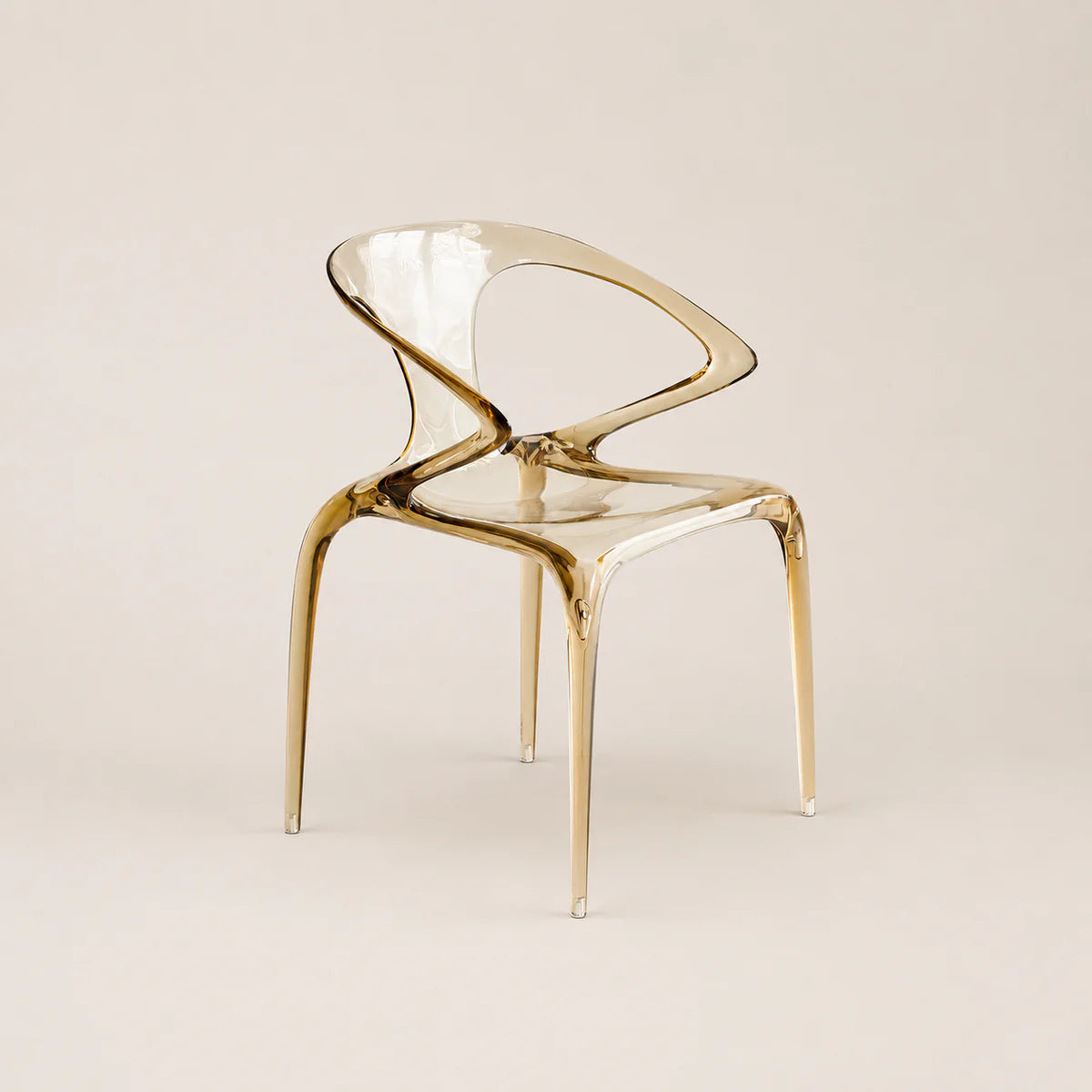Gold chair on a beige background