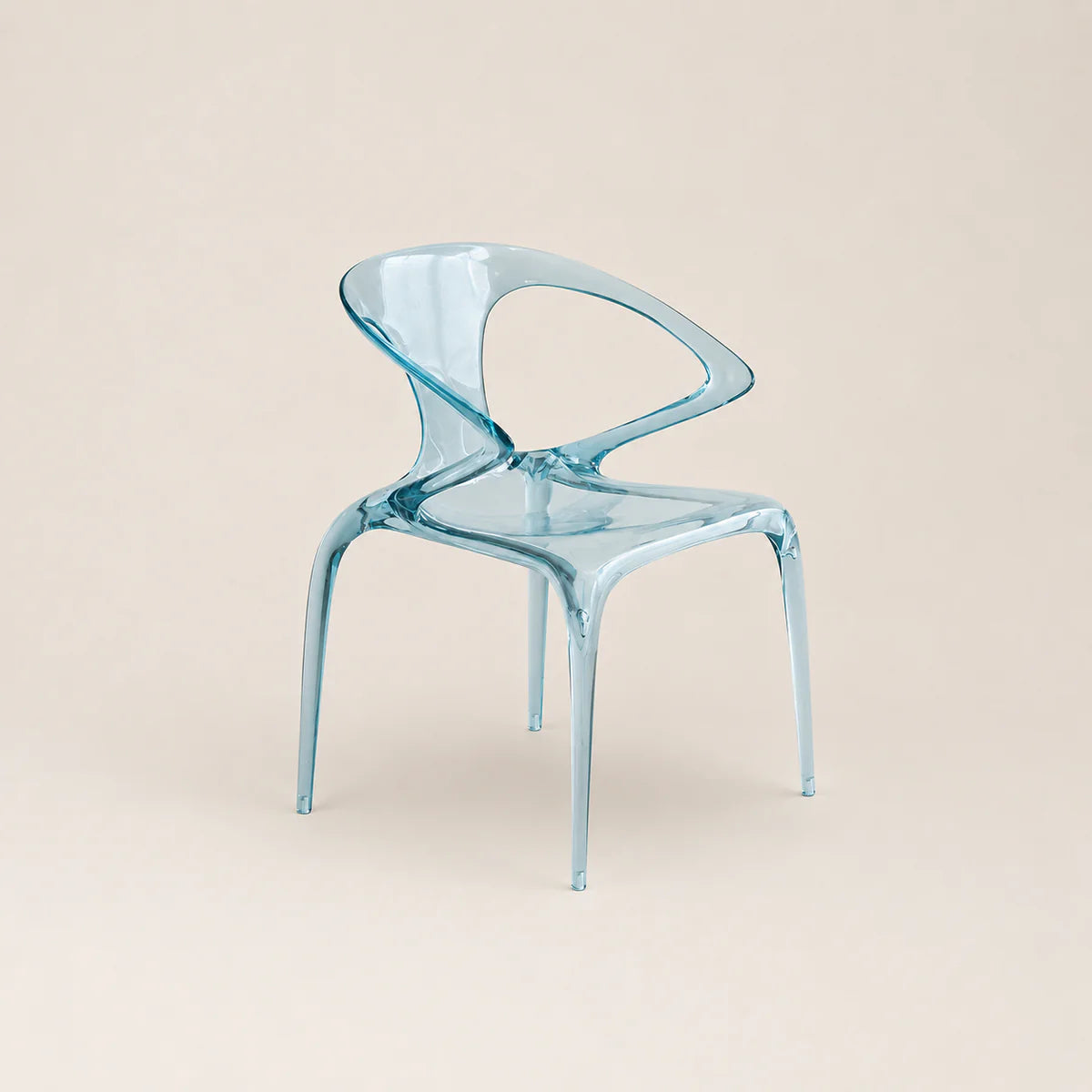 Clear blue chair on a beige background