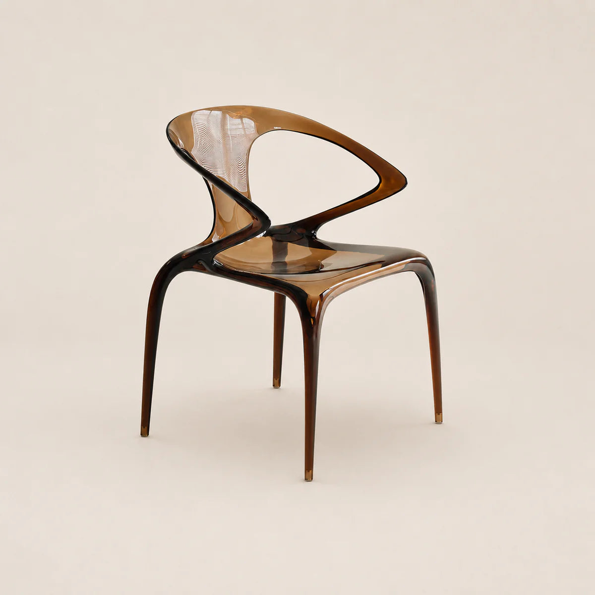 Modern chair with a transparent backrest on a beige background