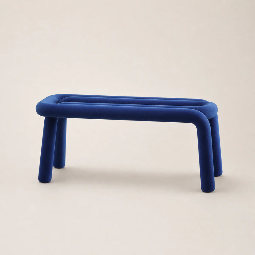 Blue stool on a beige background