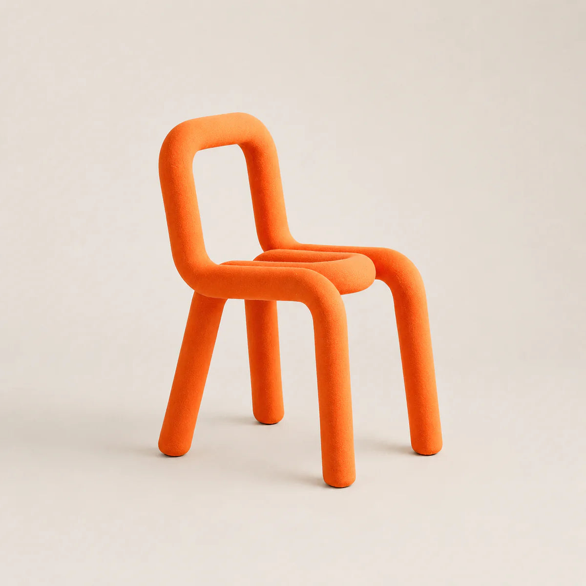 Orange chair on a beige background