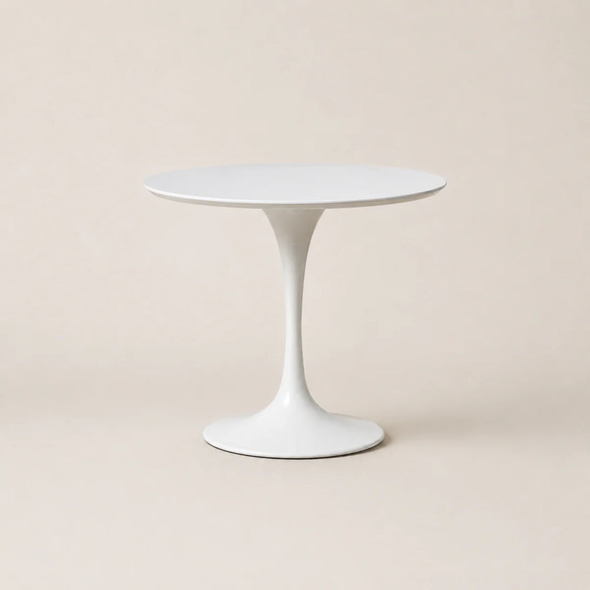 White round table on a beige background