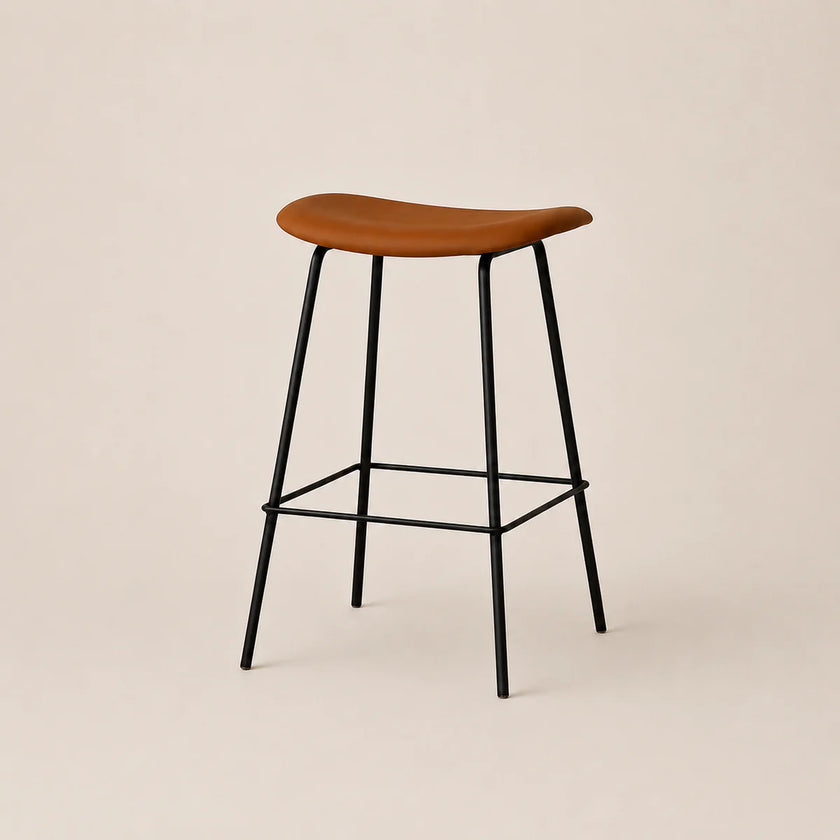 Bar stool with wooden seat and black metal legs on a beige background